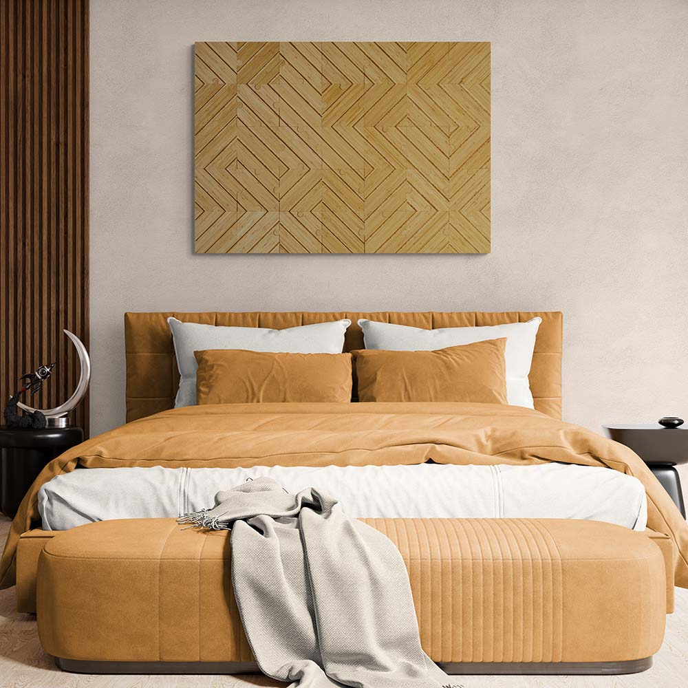 Labyrinth plyboo puzzle on the wall above a modern leaver orange bed