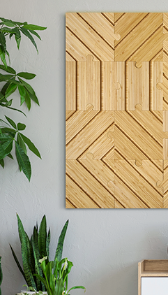 plyboo puzzle on the wall above a plant