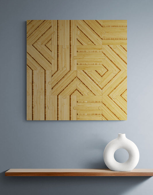 Mystery plyboo puzzle on a blue wall over a minimal display shelf